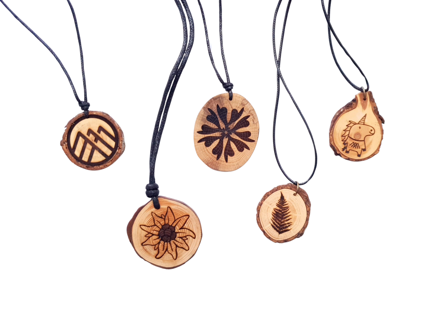 Zirbenholzschmuck Ø2-3cm | verschiedene Motive | aus Tirol in Österreich